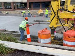 workers pouring cement