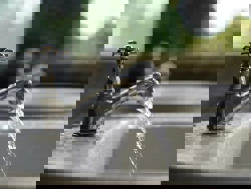 Faucet Running Water Shutterstock 153406115